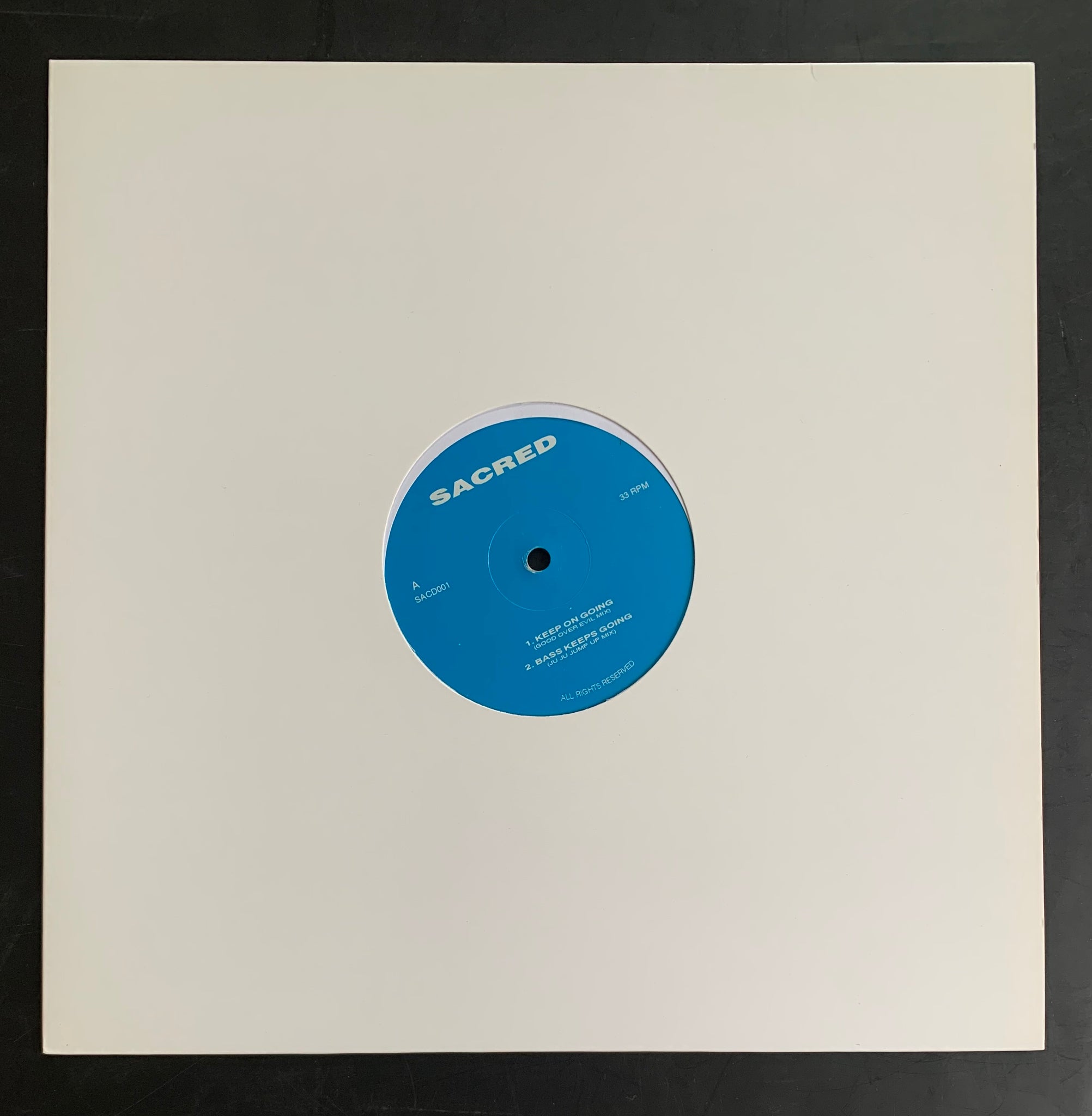 Sacred 'Keep On Going / Bass Keeps Going / Do It Together' 12"